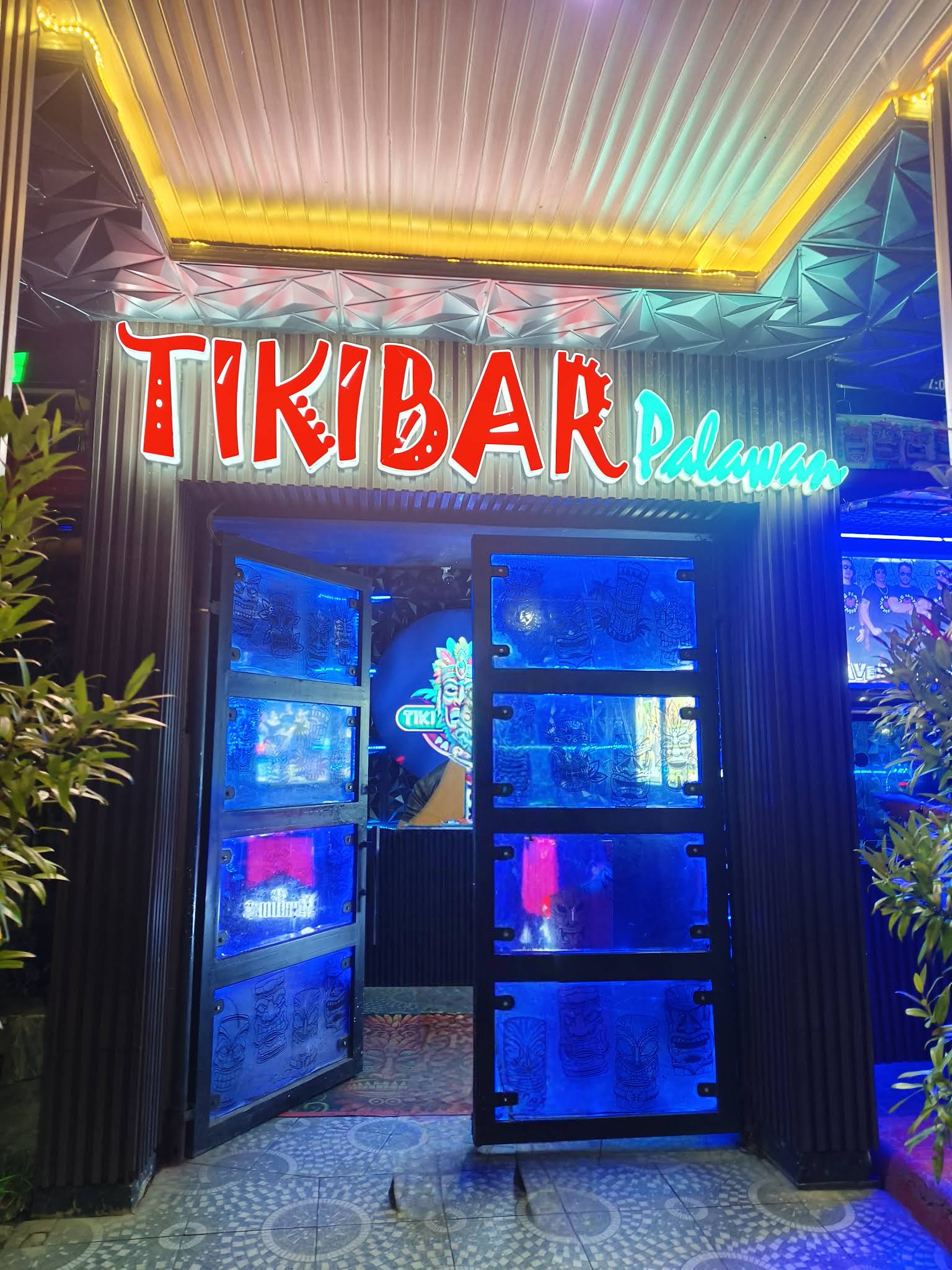 Tiki Resto Bar — bar and restaurant in Puerto Princesa, Palawan with vibrant tropical interior decor and warm lighting